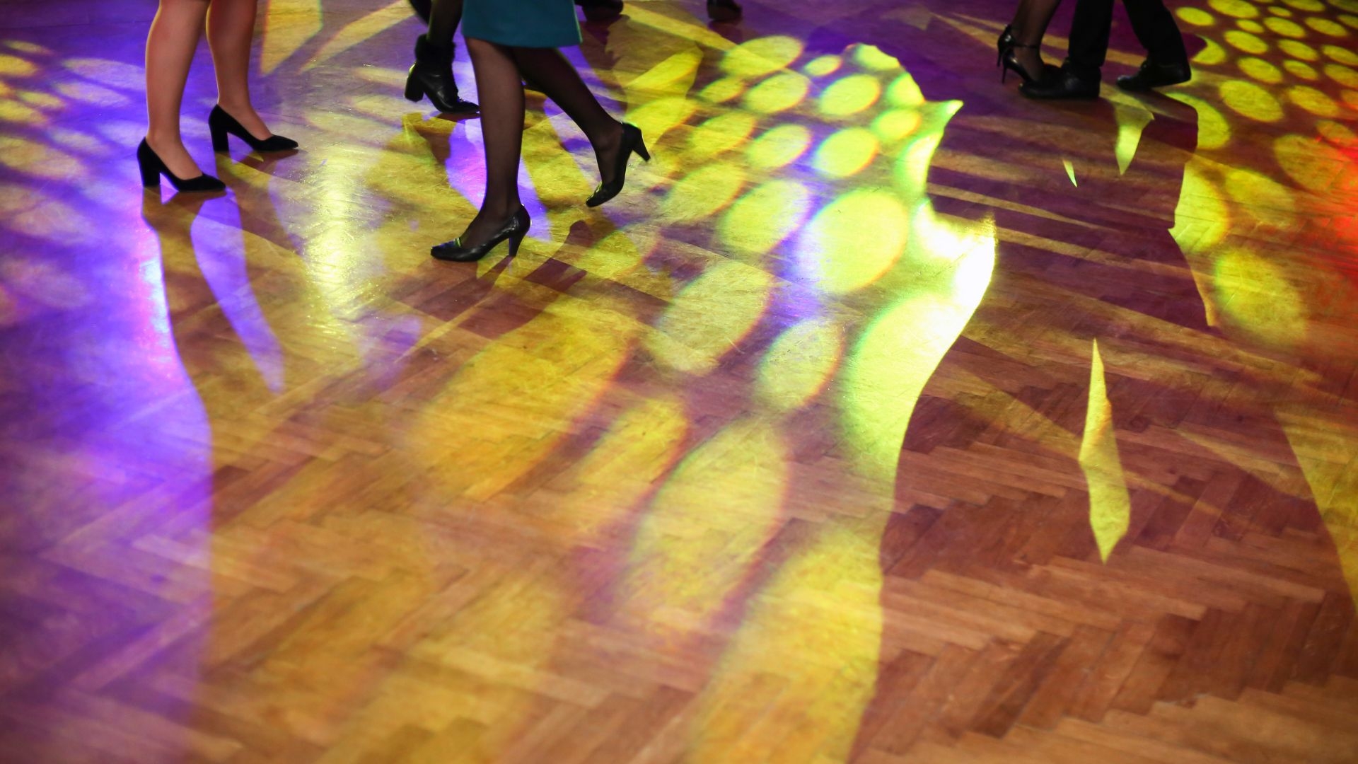 Are there specific safety standards or regulations regarding the use of anti-slip coatings on dance floors?